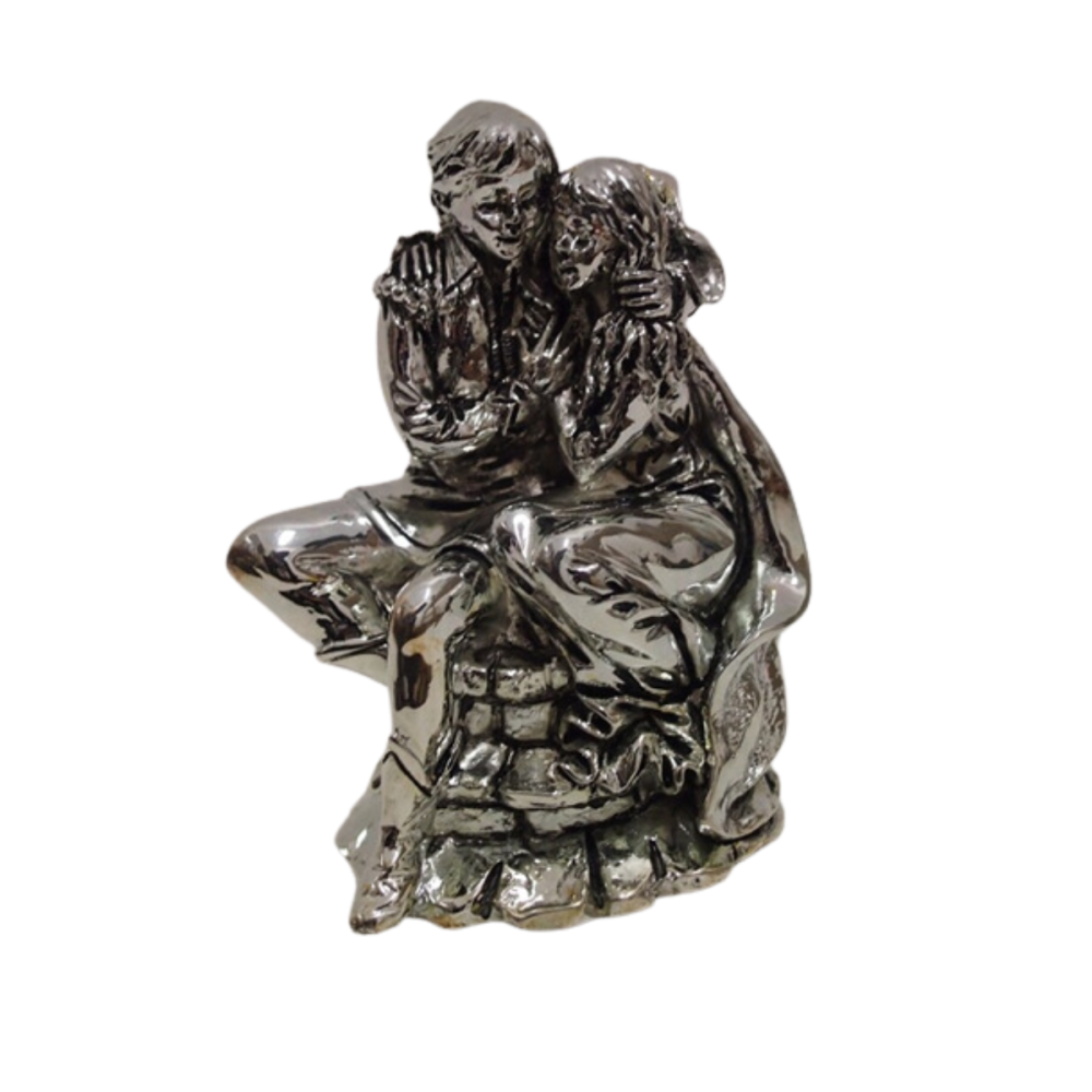 PAREJA ENAMORADA SENTADOS PLATINA 12 CMS.